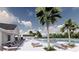 Community pool with lounge chairs and adjacent clubhouse at 5054 Selene Ct., Myrtle Beach, SC 29588