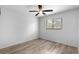 Well-lit bedroom featuring wood-look floors and ceiling fan at 1301 Pridgen Rd. # 1008, Myrtle Beach, SC 29577