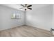 Bedroom with ceiling fan and wood-look floors at 1301 Pridgen Rd. # 1008, Myrtle Beach, SC 29577