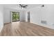 Spacious bedroom with ceiling fan and wood-look floors at 1301 Pridgen Rd. # 1008, Myrtle Beach, SC 29577