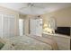 Main bedroom with a queen bed, dresser and access to the bathroom at 5905 S Kings Highway # 219-B, Myrtle Beach, SC 29575