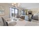 Bright dining area with white table and ocean views at 5905 S Kings Highway # 219-B, Myrtle Beach, SC 29575