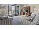 Living room with comfy sofas, balcony access, and coastal decor at 5905 S Kings Highway # 219-B, Myrtle Beach, SC 29575