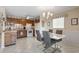 Fully equipped kitchen with wood cabinets and white appliances at 5905 S Kings Highway # 219-B, Myrtle Beach, SC 29575
