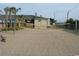 Beach volleyball court with net and sand; great for recreation at 5905 S Kings Highway # 219-B, Myrtle Beach, SC 29575