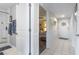 Clean and bright hallway leading to the bedrooms and bathroom at 5905 S Kings Highway # 219-B, Myrtle Beach, SC 29575