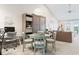 Small dining area with table and chairs, near workspace and living room at 4755 Lightkeepers Way # 15-F, Little River, SC 29566