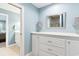 Elegant bathroom with double sinks, a large vanity, and a walk-in shower at 4755 Lightkeepers Way # 15-F, Little River, SC 29566