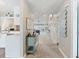 Bright hallway with view into living area and kitchen at 4755 Lightkeepers Way # 15-F, Little River, SC 29566