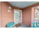 Private condo entry with teal table and door access at 4755 Lightkeepers Way # 15-F, Little River, SC 29566