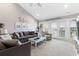 Spacious living room with water views, comfy seating, and a large TV at 4755 Lightkeepers Way # 15-F, Little River, SC 29566
