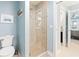 Clean bathroom with a toilet and a large glass shower at 4755 Lightkeepers Way # 15-F, Little River, SC 29566