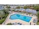 Community pool with waterfront views and lounge chairs at 4755 Lightkeepers Way # 15-F, Little River, SC 29566