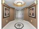 Bright entryway with tile floor and artwork at 2151 Bridgeview Ct. # 3-303, North Myrtle Beach, SC 29582