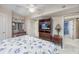 Bedroom with a queen bed, TV, and access to another room at 2151 Bridgeview Ct. # 3-303, North Myrtle Beach, SC 29582