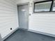 Gray front door entry to condo unit V306 at 2000 Ocean Blvd. S # 306, Myrtle Beach, SC 29577