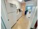 Well-equipped kitchen featuring white cabinets and modern appliances at 2000 Ocean Blvd. S # 306, Myrtle Beach, SC 29577