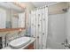 Bathroom with single vanity and shower/tub combo at 6001-5027 S Kings Hwy., Myrtle Beach, SC 29575