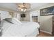 Main bedroom with ceiling fan and ensuite bathroom at 6001-5027 S Kings Hwy., Myrtle Beach, SC 29575