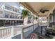 Spacious front porch with seating area and beachy decor at 6001-5027 S Kings Hwy., Myrtle Beach, SC 29575