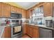 Updated kitchen with granite countertops and stainless steel appliances at 6001-5027 S Kings Hwy., Myrtle Beach, SC 29575