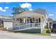 Adorable beach cottage with a porch and ramp access at 6001-5027 S Kings Hwy., Myrtle Beach, SC 29575