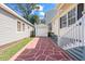 Side yard with a paved walkway leading to the garage at 6001-5027 S Kings Hwy., Myrtle Beach, SC 29575