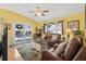 Comfortable living room with leather seating and a view of the porch at 6001-5027 S Kings Hwy., Myrtle Beach, SC 29575