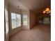 Bright dining area with large windows overlooking the golf course at 4870 Luster Leaf Circle # 401, Myrtle Beach, SC 29577
