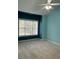 Bright bedroom with large window and ceiling fan at 4870 Luster Leaf Circle # 401, Myrtle Beach, SC 29577
