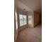 Bright bedroom with large windows offering a view of the golf course at 4870 Luster Leaf Circle # 401, Myrtle Beach, SC 29577