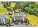 Aerial view of building, pool, and golf course at 4870 Luster Leaf Circle # 401, Myrtle Beach, SC 29577