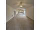 Spacious living room with high ceilings and neutral carpeting at 4870 Luster Leaf Circle # 401, Myrtle Beach, SC 29577