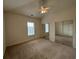Well-lit bedroom with ceiling fan and mirrored closet doors at 4870 Luster Leaf Circle # 401, Myrtle Beach, SC 29577