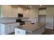 Modern kitchen with white cabinets, granite countertops, and stainless steel appliances at Lot 725 Zoe Way, Myrtle Beach, SC 29588