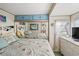 Bedroom with mirrored closet doors and beach-themed decor at 6001-1092 S Kings Hwy., Myrtle Beach, SC 29575