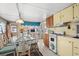 Cozy kitchen with wood cabinets and white appliances at 6001-1092 S Kings Hwy., Myrtle Beach, SC 29575