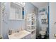 Bathroom with white vanity, toilet, and decorative wall accents at 6001-1092 S Kings Hwy., Myrtle Beach, SC 29575
