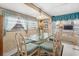 Bright dining area with glass table and seating for six at 6001-1092 S Kings Hwy., Myrtle Beach, SC 29575