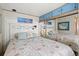 Bedroom with mirrored closet doors and beach-themed decor at 6001-1092 S Kings Hwy., Myrtle Beach, SC 29575