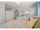 Bedroom with white armoire, seashell bedding, and stackable washer/dryer at 6001-1092 S Kings Hwy., Myrtle Beach, SC 29575