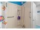 Small bathroom with shower/tub combo and seashell-themed decor at 6001-1092 S Kings Hwy., Myrtle Beach, SC 29575