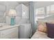 Compact laundry closet with stackable washer and dryer at 6001-1092 S Kings Hwy., Myrtle Beach, SC 29575