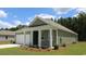 Two-story house with a covered porch and attached garage at 331 Cheerful Way, Little River, SC 29566