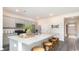 Kitchen with granite island, stainless steel appliances, and gray cabinets at 331 Cheerful Way, Little River, SC 29566