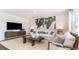 Relaxing living room with a neutral color palette and modern furniture at 331 Cheerful Way, Little River, SC 29566
