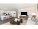 Open concept living room with kitchen views and an island at 331 Cheerful Way, Little River, SC 29566
