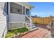 Steps leading to a screened porch and fenced backyard at 8586 Edgewood Dr., Myrtle Beach, SC 29588