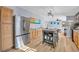 Modern kitchen features stainless steel fridge and light wood cabinets at 8586 Edgewood Dr., Myrtle Beach, SC 29588