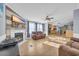 Open living room with a fireplace, and kitchen view at 8586 Edgewood Dr., Myrtle Beach, SC 29588